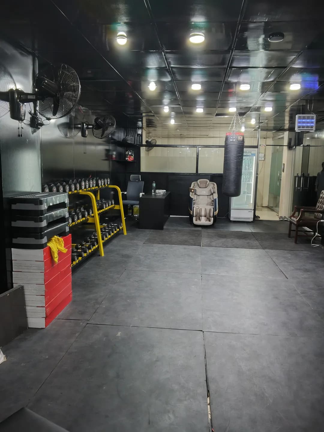 Studio desk, seating and free-weight rack
